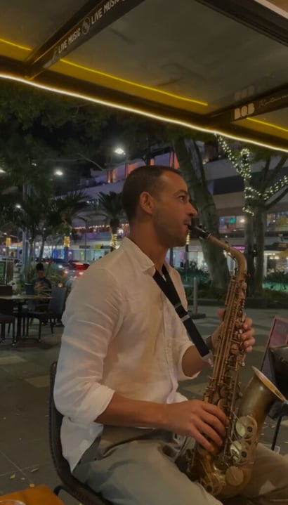 Andre Ferrari playing saxophone